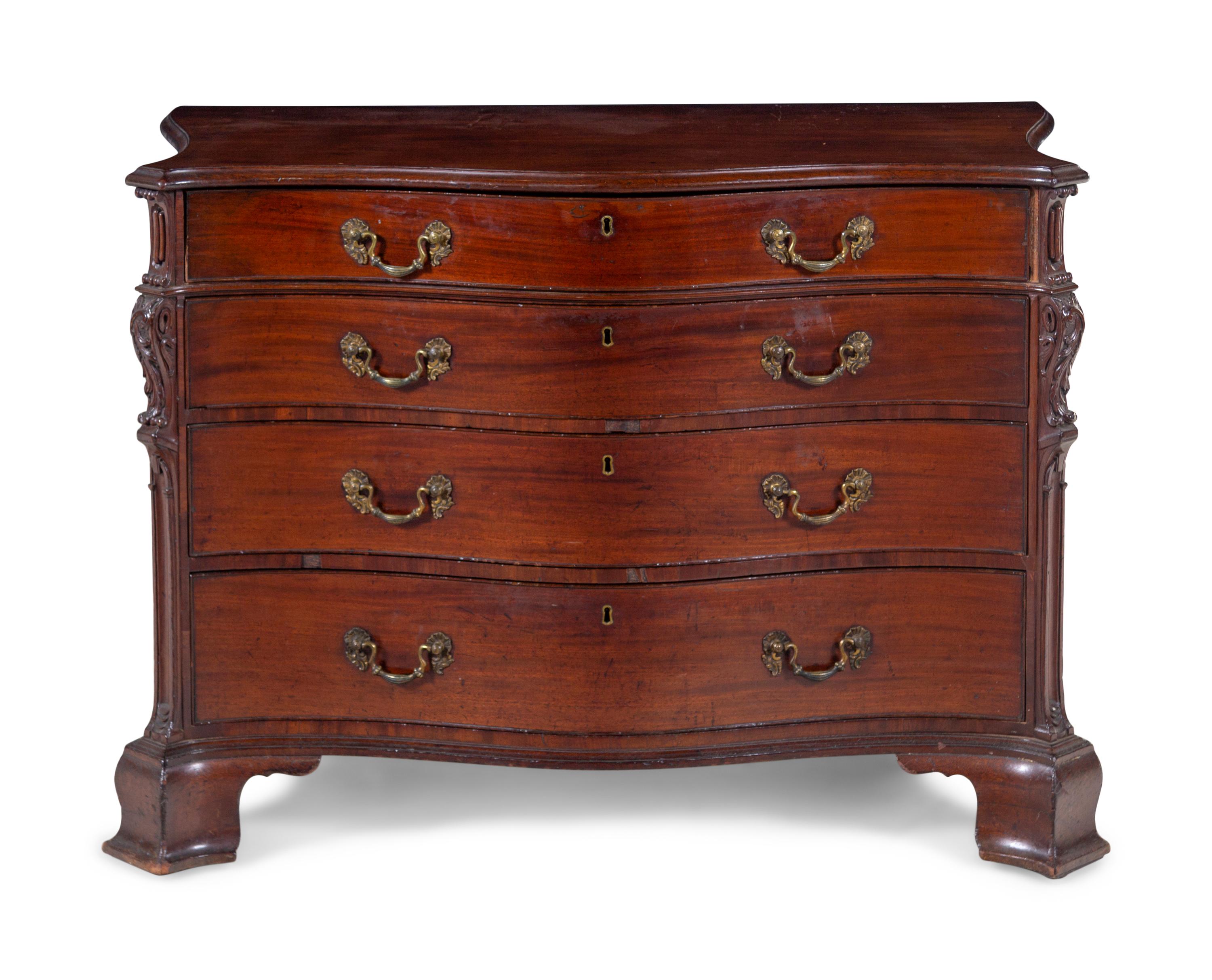 A George III Carved Mahogany Chest of Drawers