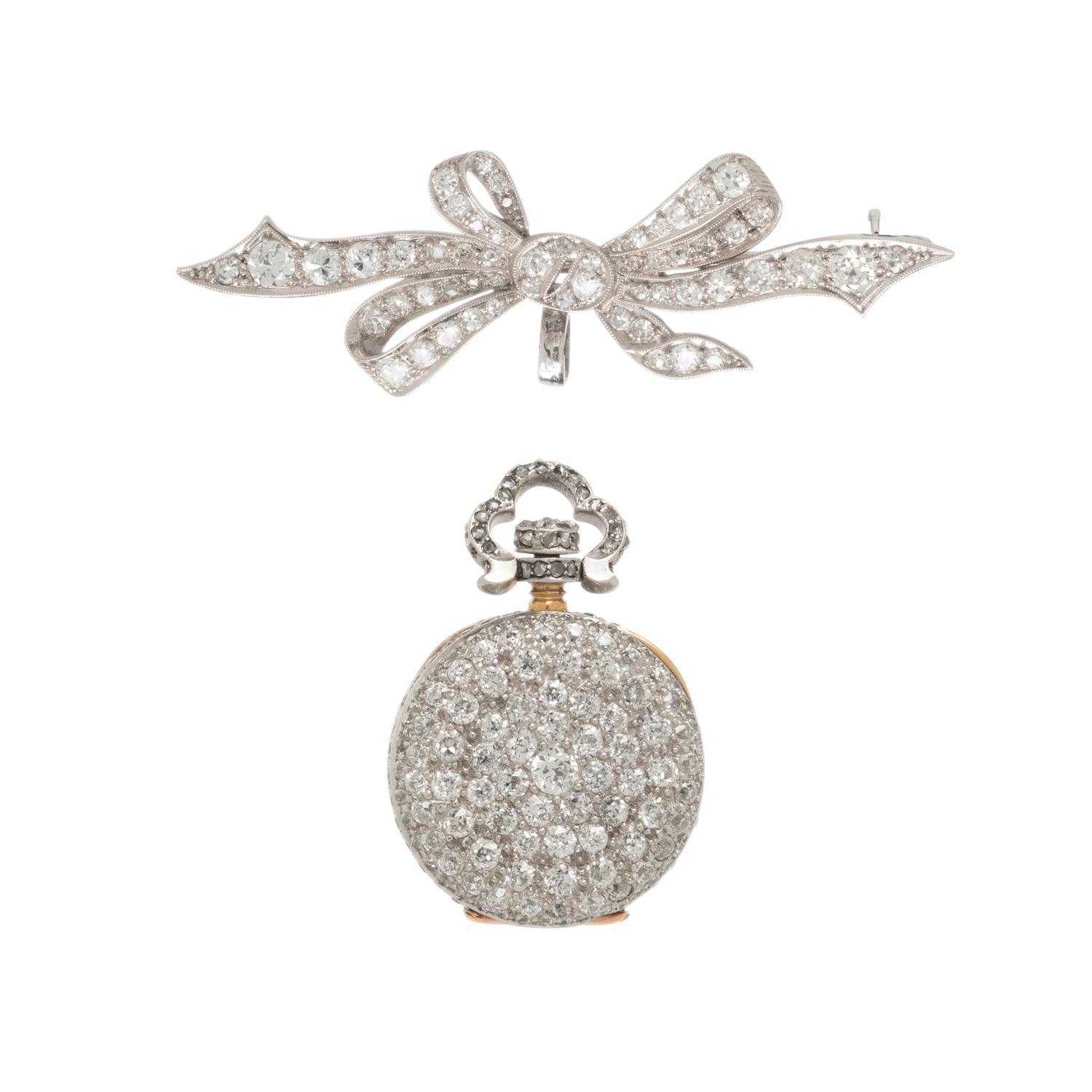DIAMOND AND PLATINUM LAPEL WATCH