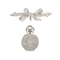 DIAMOND AND PLATINUM LAPEL WATCH