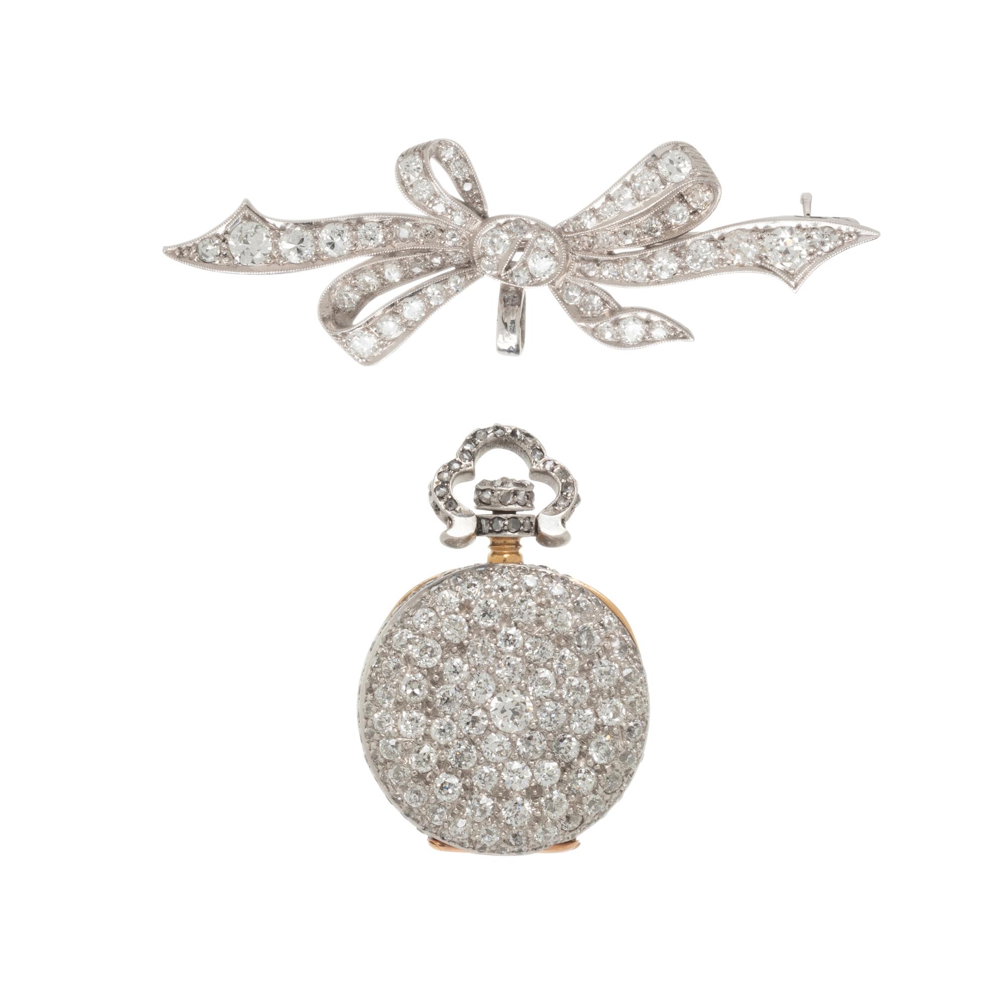 DIAMOND AND PLATINUM LAPEL WATCH