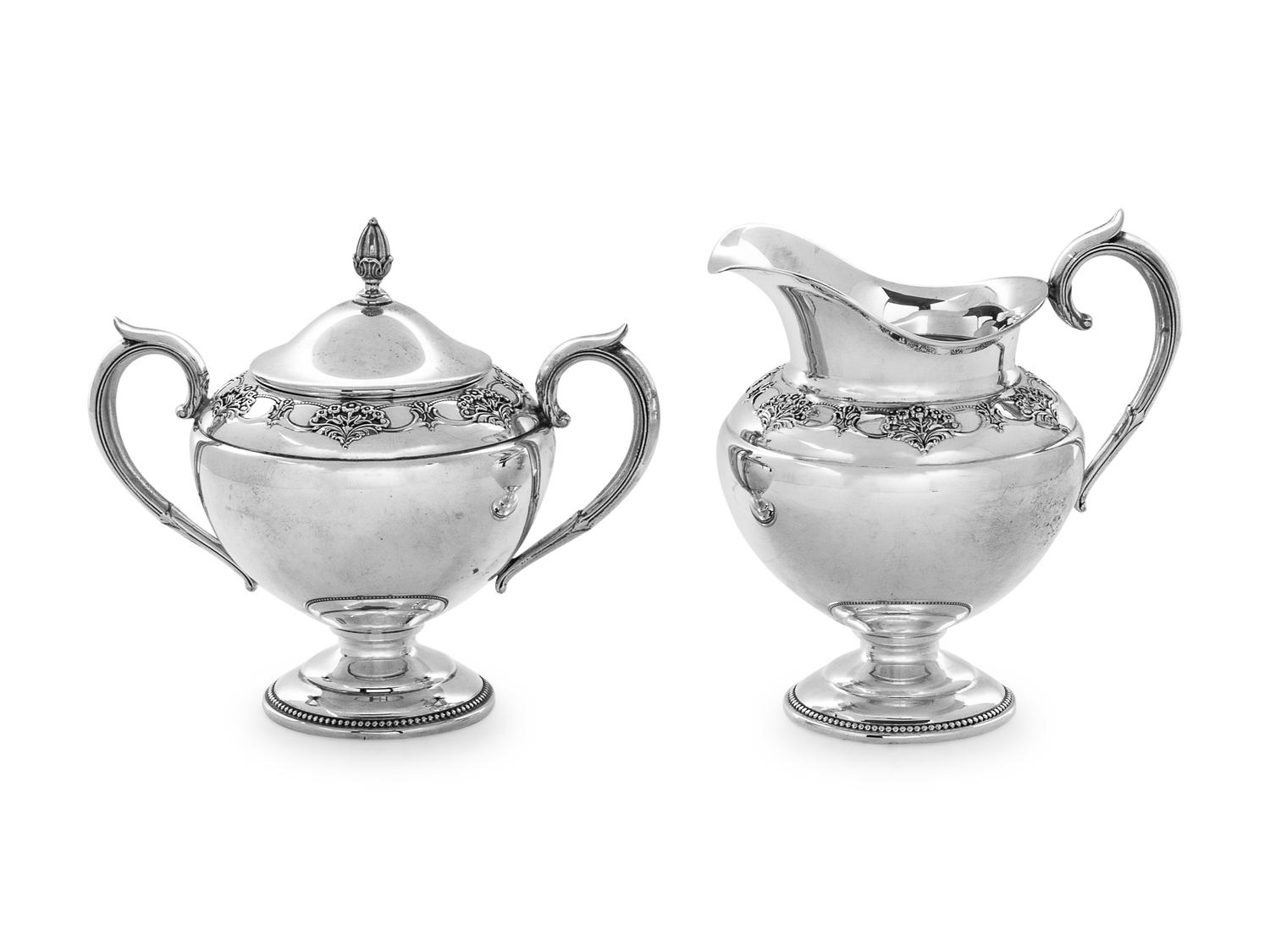 each with band of floral decoration.