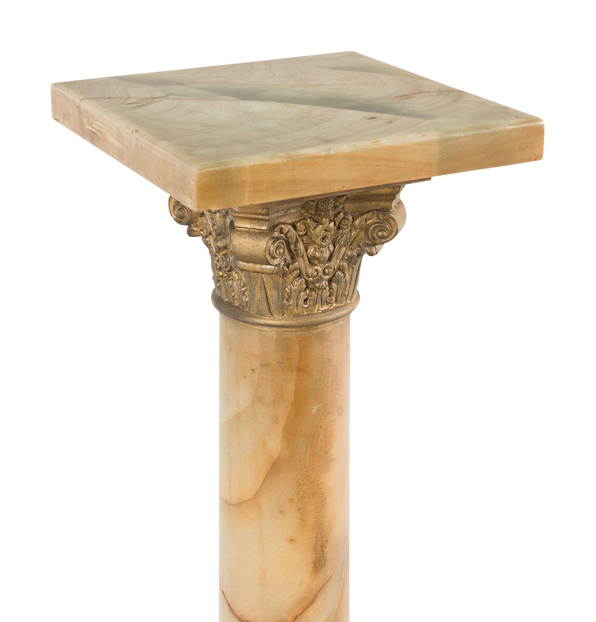 A Neoclassical Style Gilt Metal Mounted Onyx Column Form Pedestal