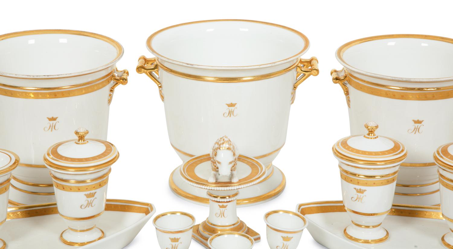 A Continental Gilt Decorated Porcelain Dessert Service