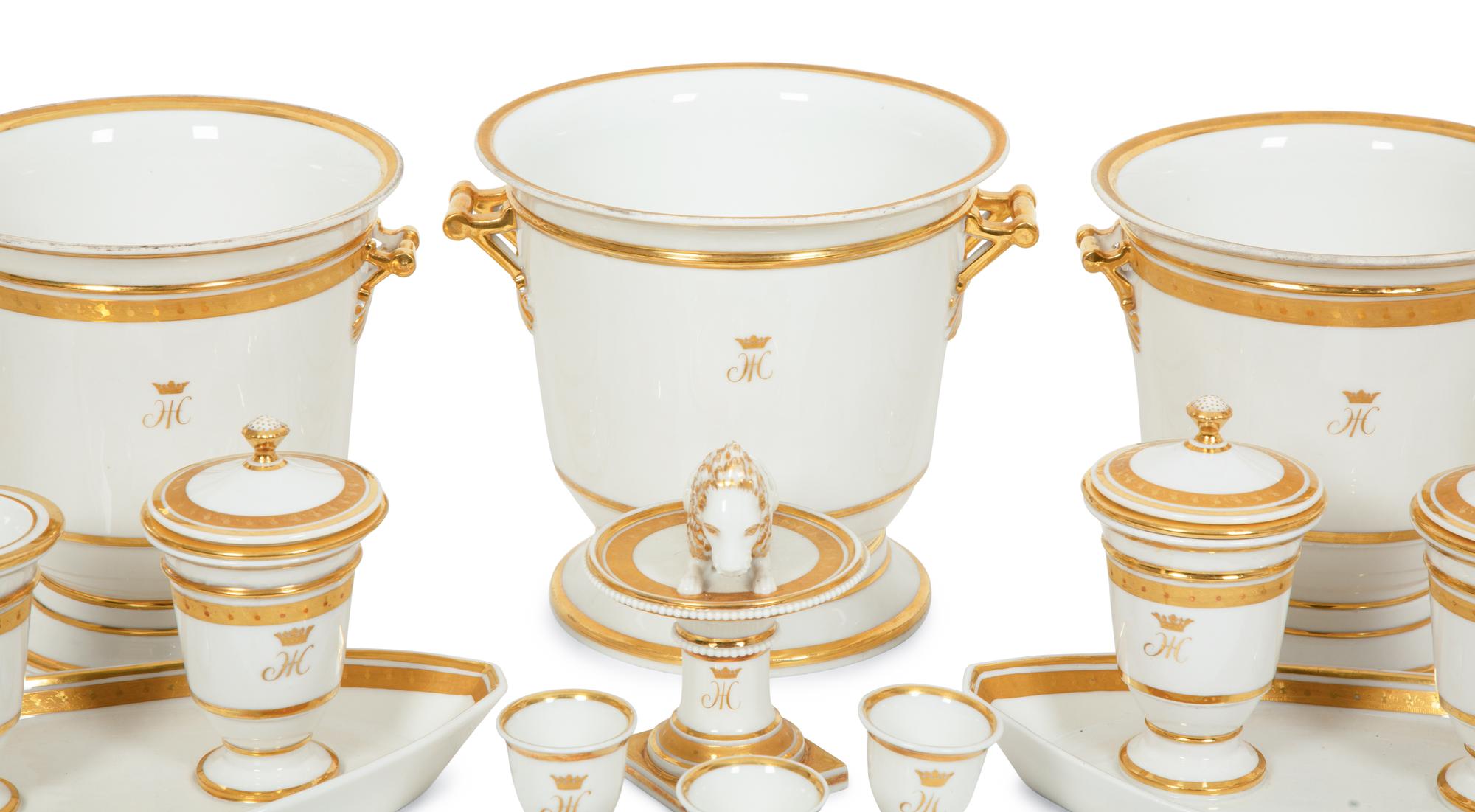 A Continental Gilt Decorated Porcelain Dessert Service