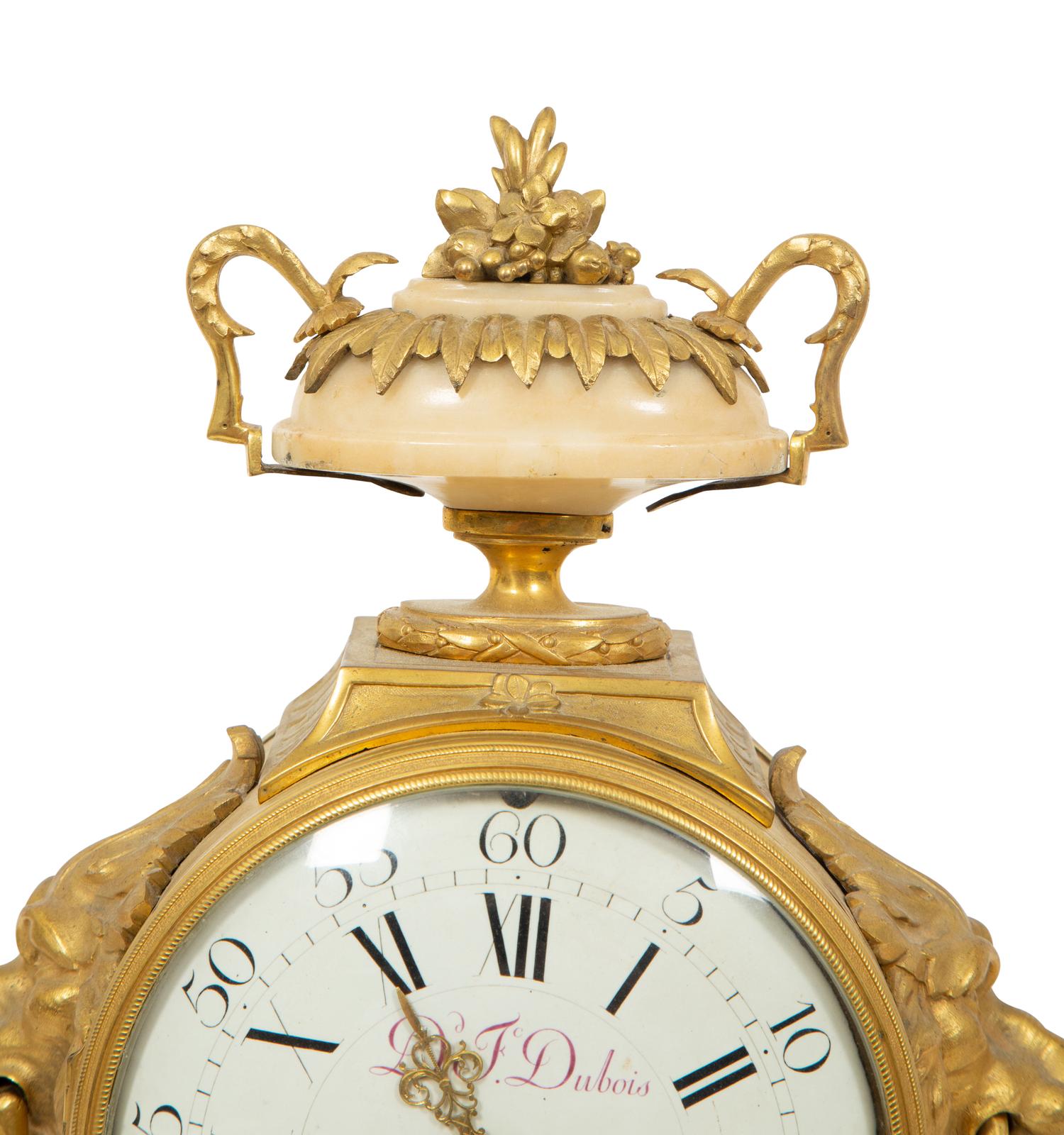 A Louis XVI Gilt Bronze and Marble Mantel Clock
