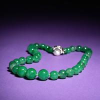 A Green Jadeite and Pearl Beaded Necklace