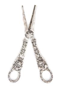 A Pair of Silver Grape Shears, Georg Jensen, of typical form, decorated with figures amongst grape vines.