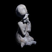 A Maya Seated Scribe