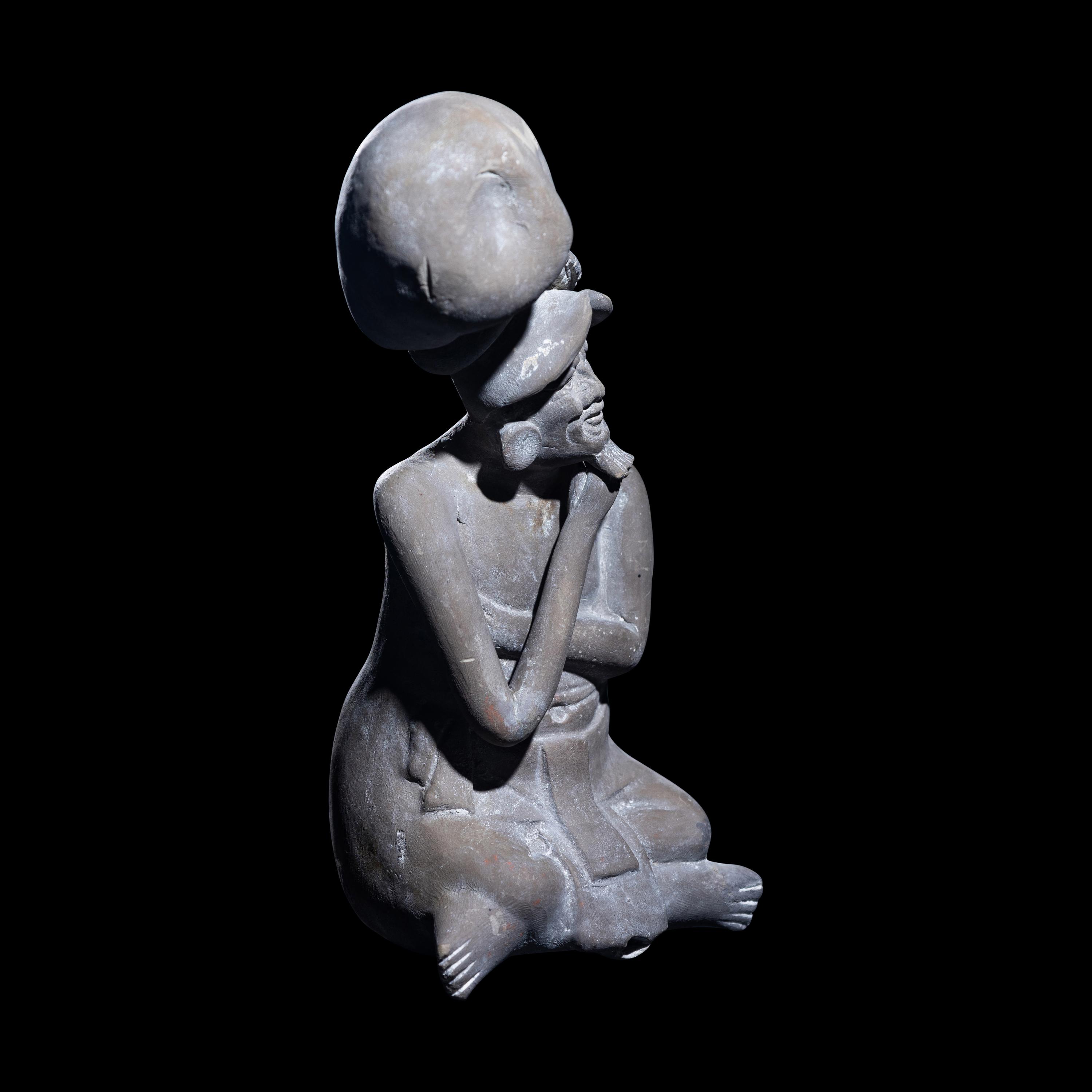 A Maya Seated Scribe