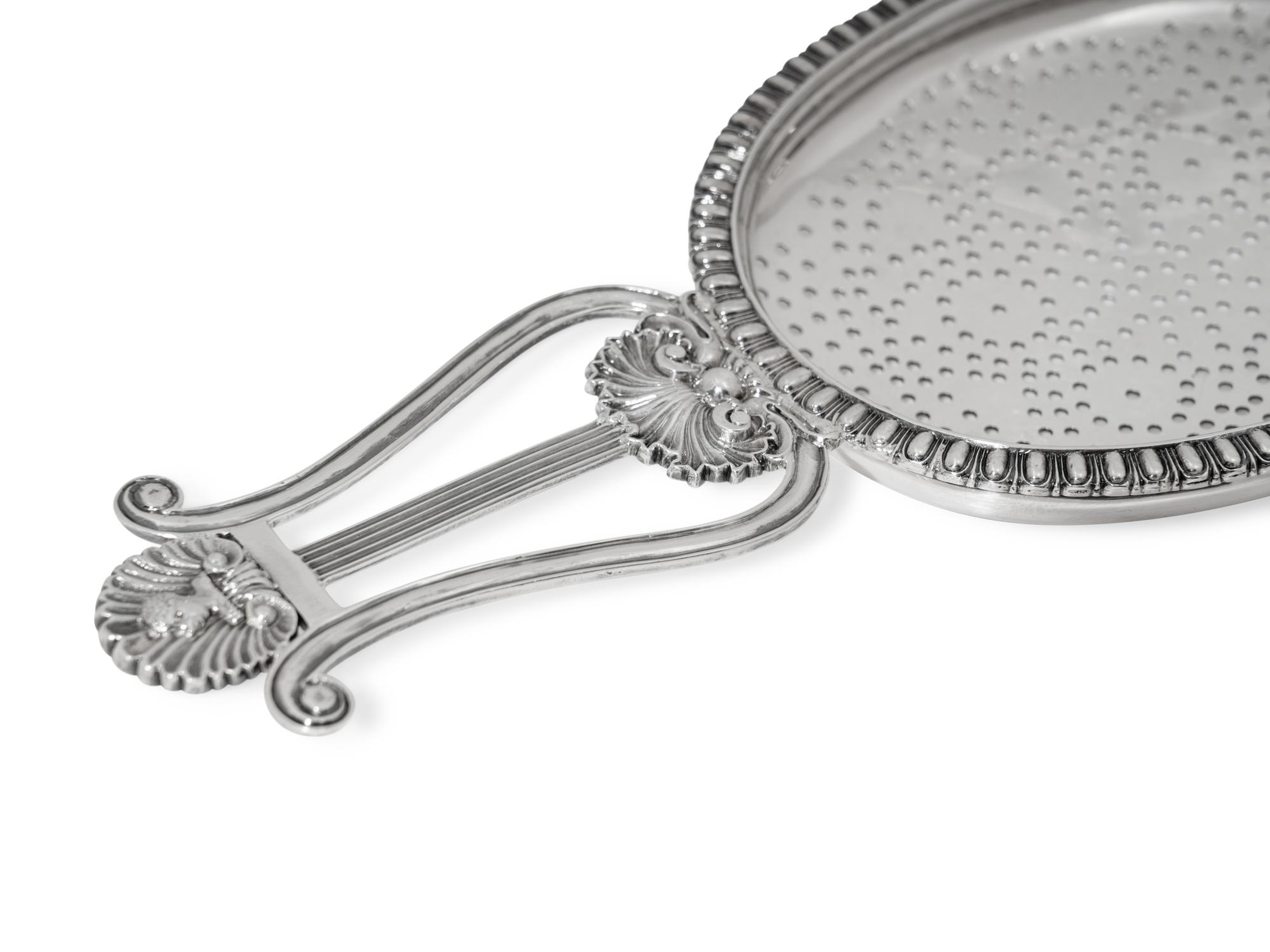 A Scottish George IV Silver Lyre Form Lemon Strainer