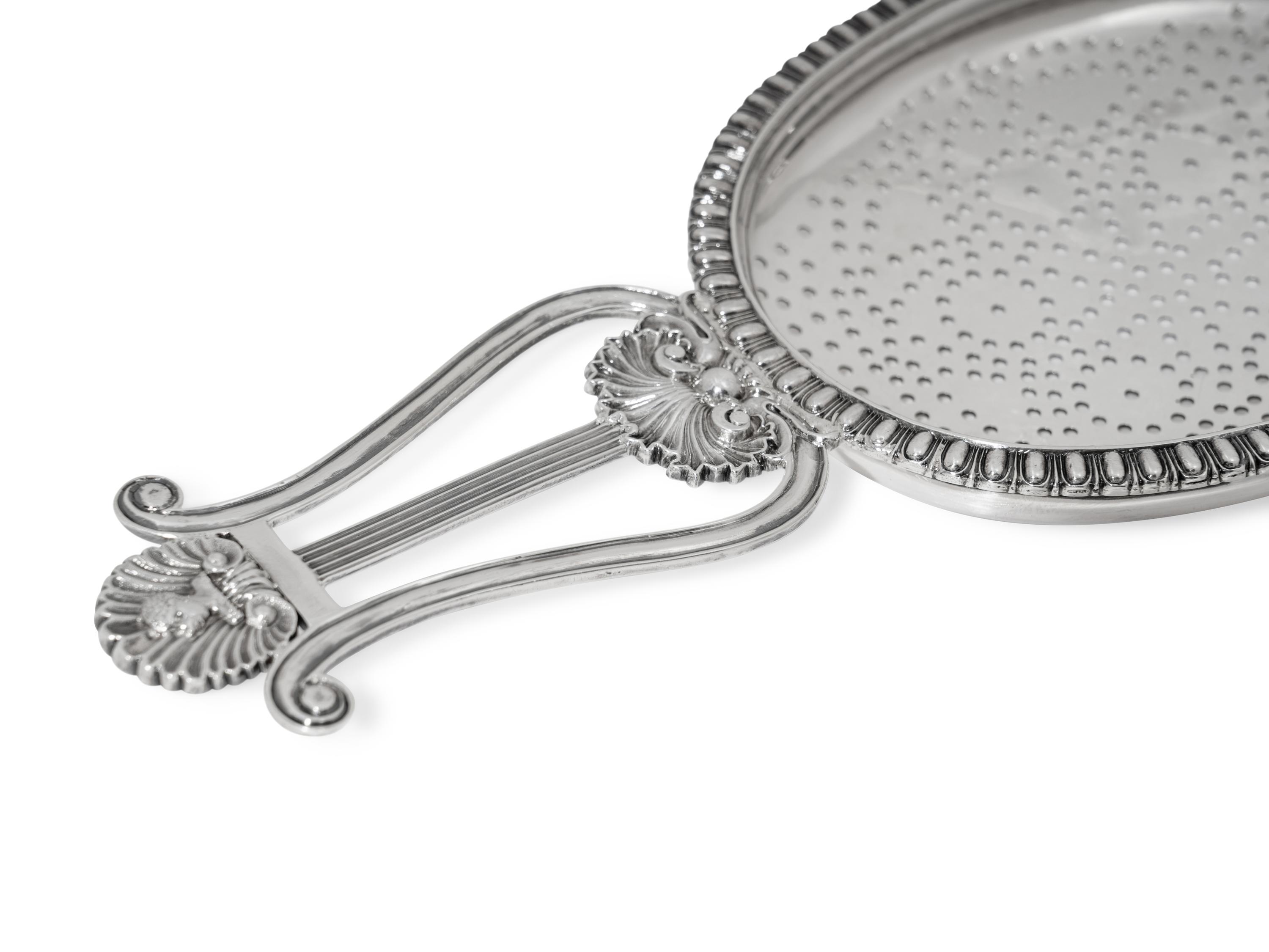 A Scottish George IV Silver Lyre Form Lemon Strainer