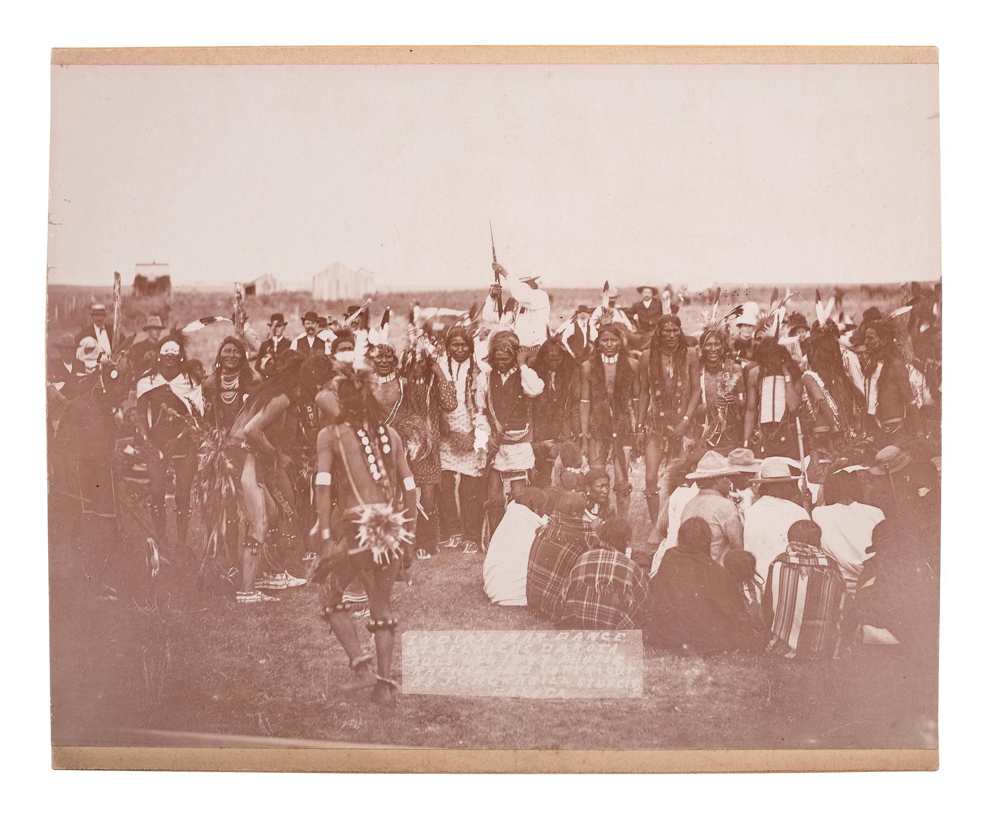[NATIVE AMERICANS]. GRABILL, J.C.H., photographer. Indian War Dance at Oelrich's, Dakota, July 4th 1887 . Sturgis, Dakota.