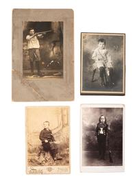 [EARLY PHOTOGRAPHY]. A group of 5 cabinet cards of children posed with BB guns, comprising: