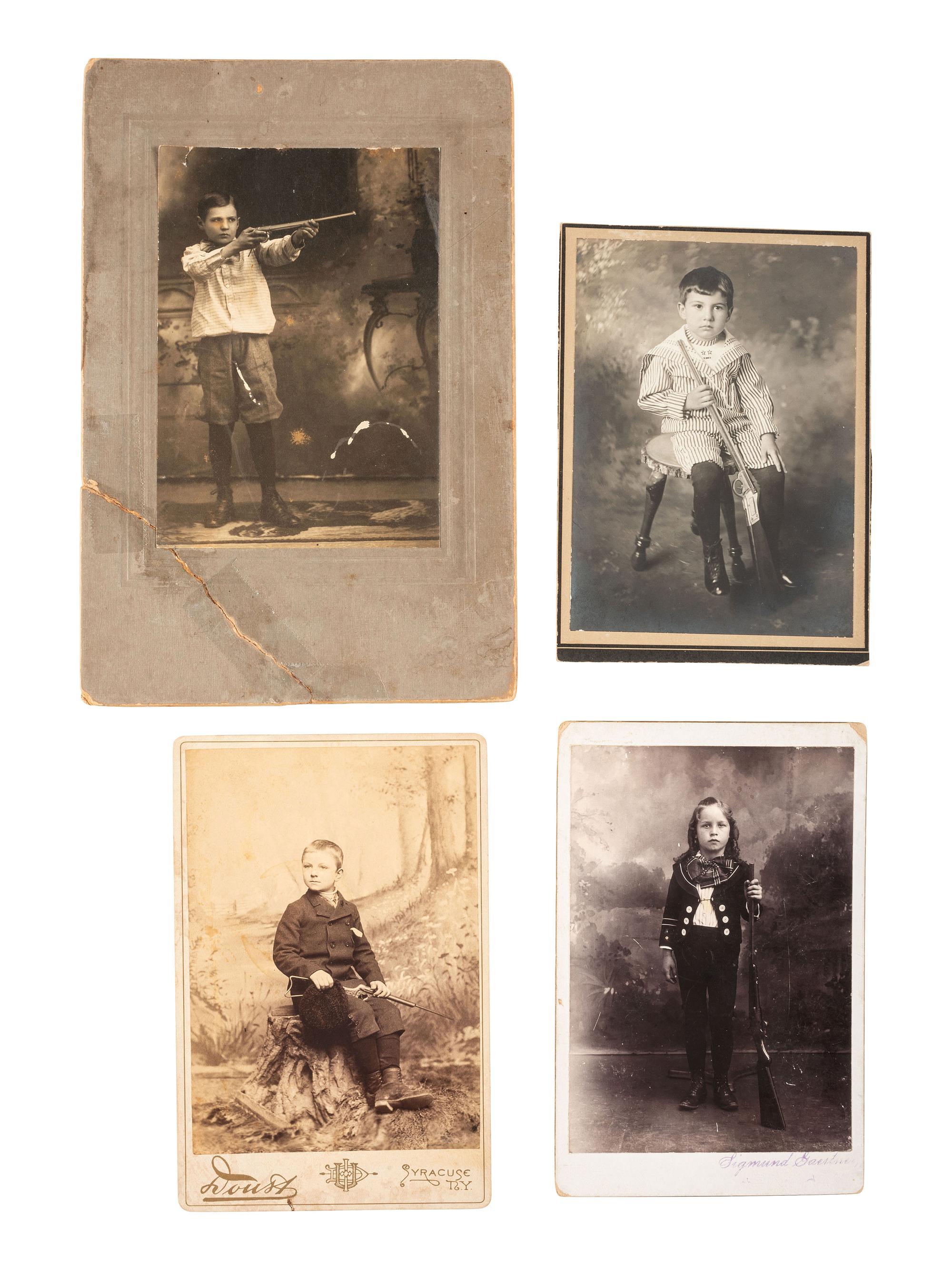 [EARLY PHOTOGRAPHY]. A group of 5 cabinet cards of children posed with BB guns, comprising: