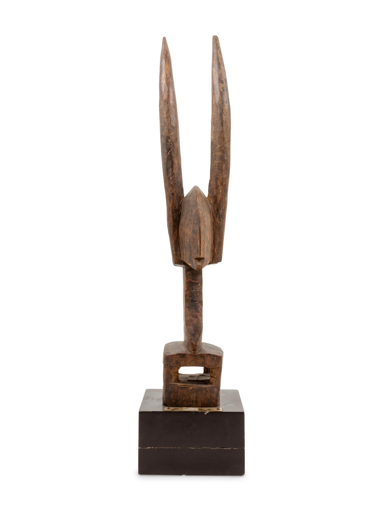 A Bambara Carved Wood Antelope Sculpture