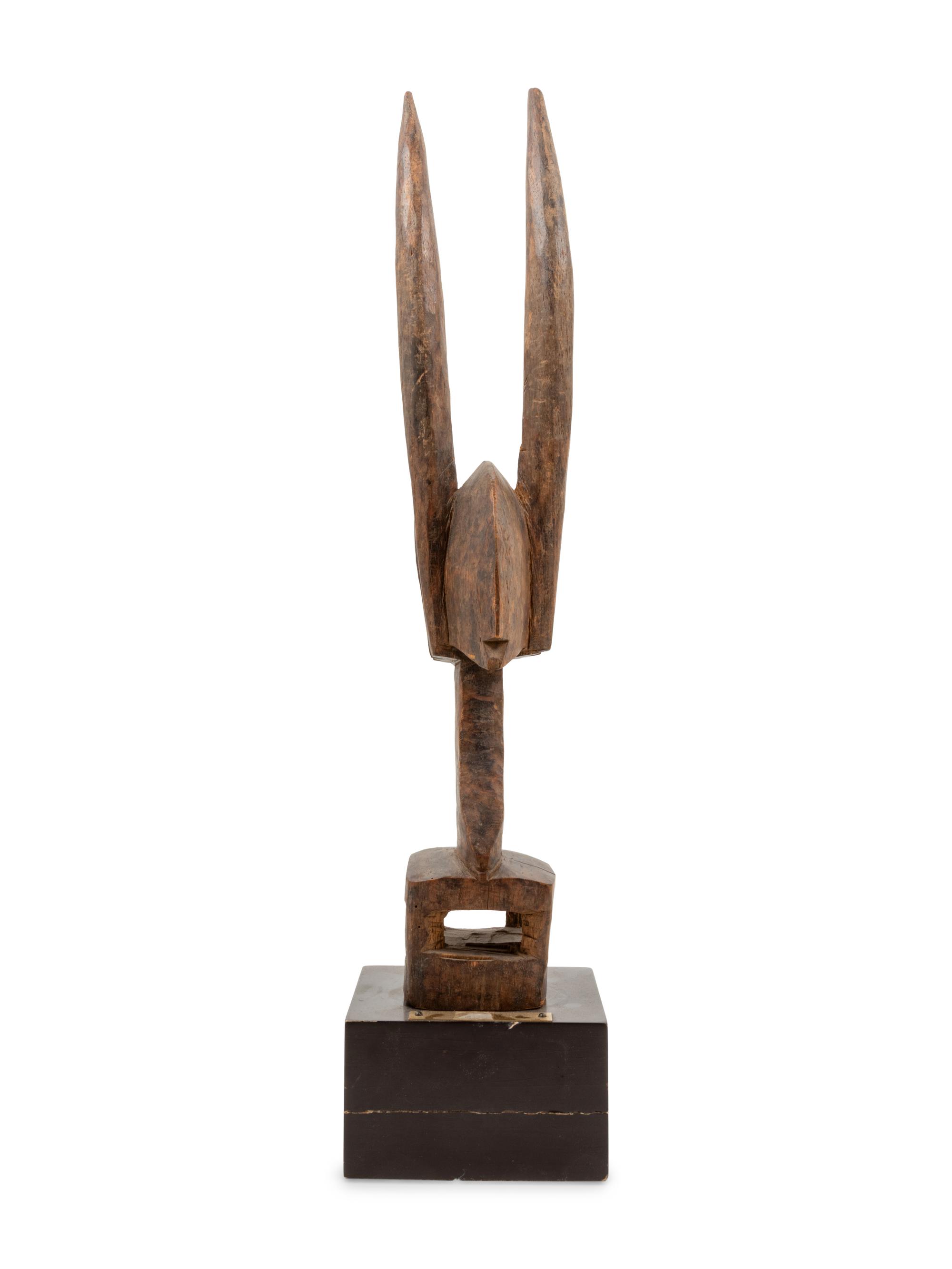 A Bambara Carved Wood Antelope Sculpture