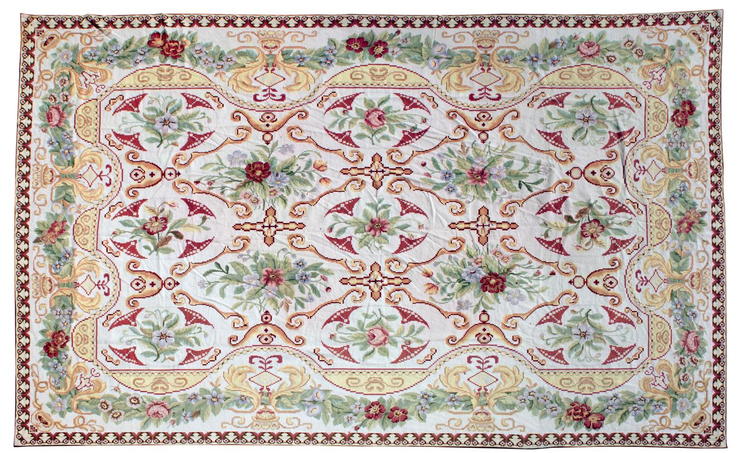 A Needlework Wool Rug — 20TH CENTURY