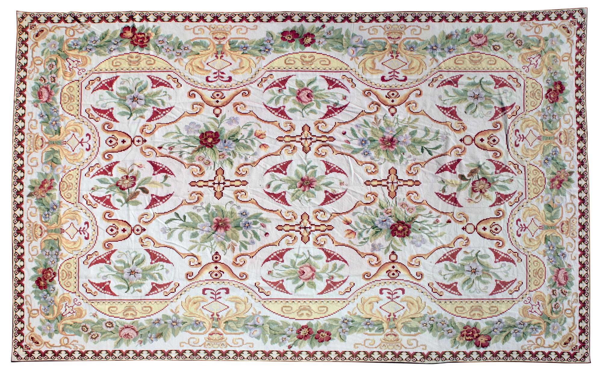 A Needlework Wool Rug — 20TH CENTURY