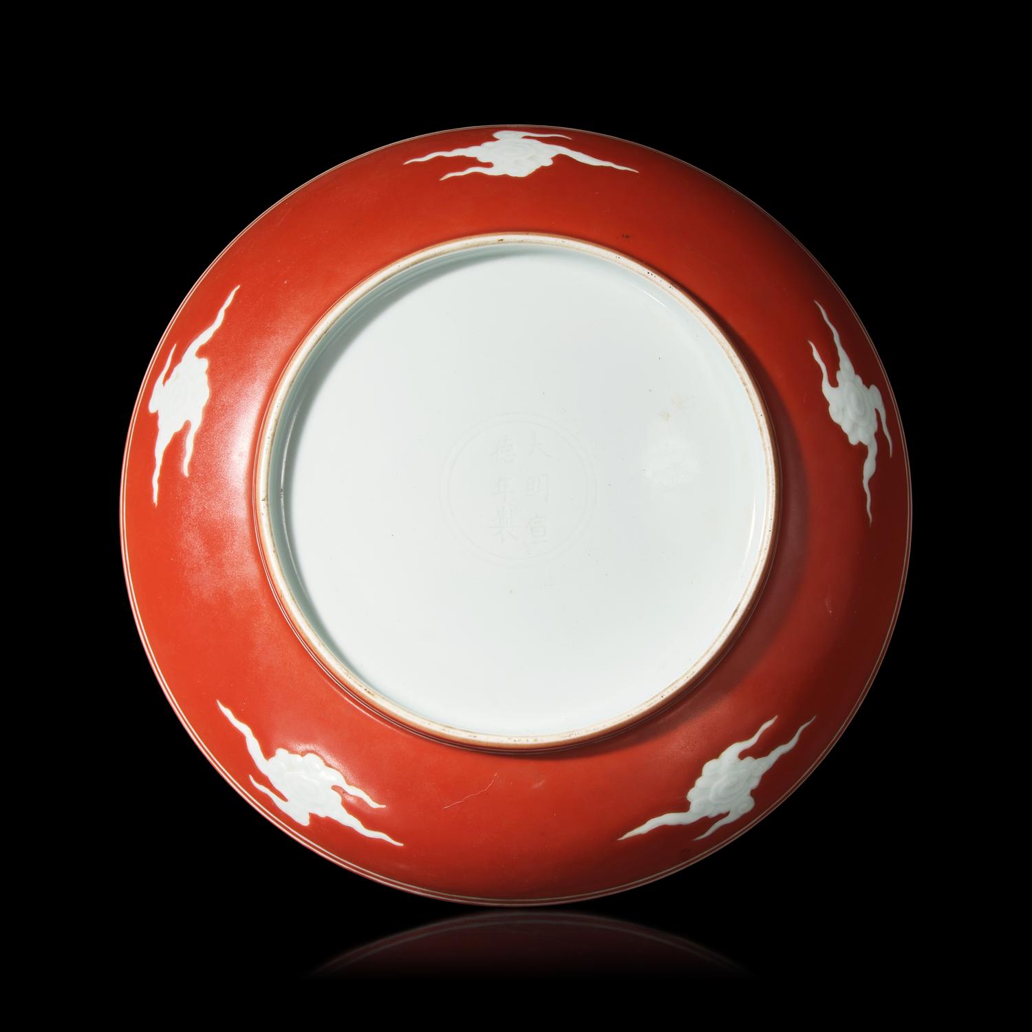 A Chinese Iron Red 'Dragon' Dish, 18th/19th Century 清中期 礬紅彩剔刻龍紋盤