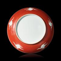 A Chinese Iron Red 'Dragon' Dish, 18th/19th Century 清中期 礬紅彩剔刻龍紋盤