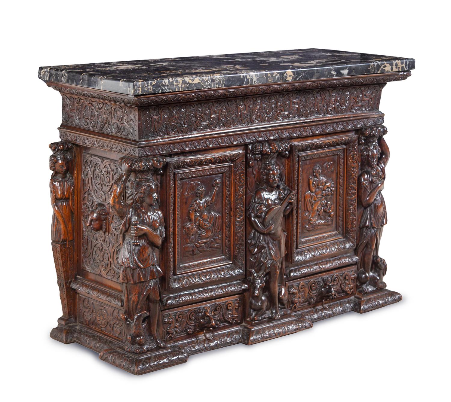 A Renaissance Revival Carved Walnut Marble-Top Cabinet