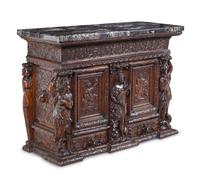 A Renaissance Revival Carved Walnut Marble-Top Cabinet
