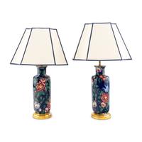A Pair of Porcelain Vases Mounted as Lamps