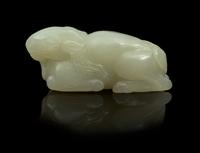 A Carved Jade Toggle Length 2 1/2 inches.