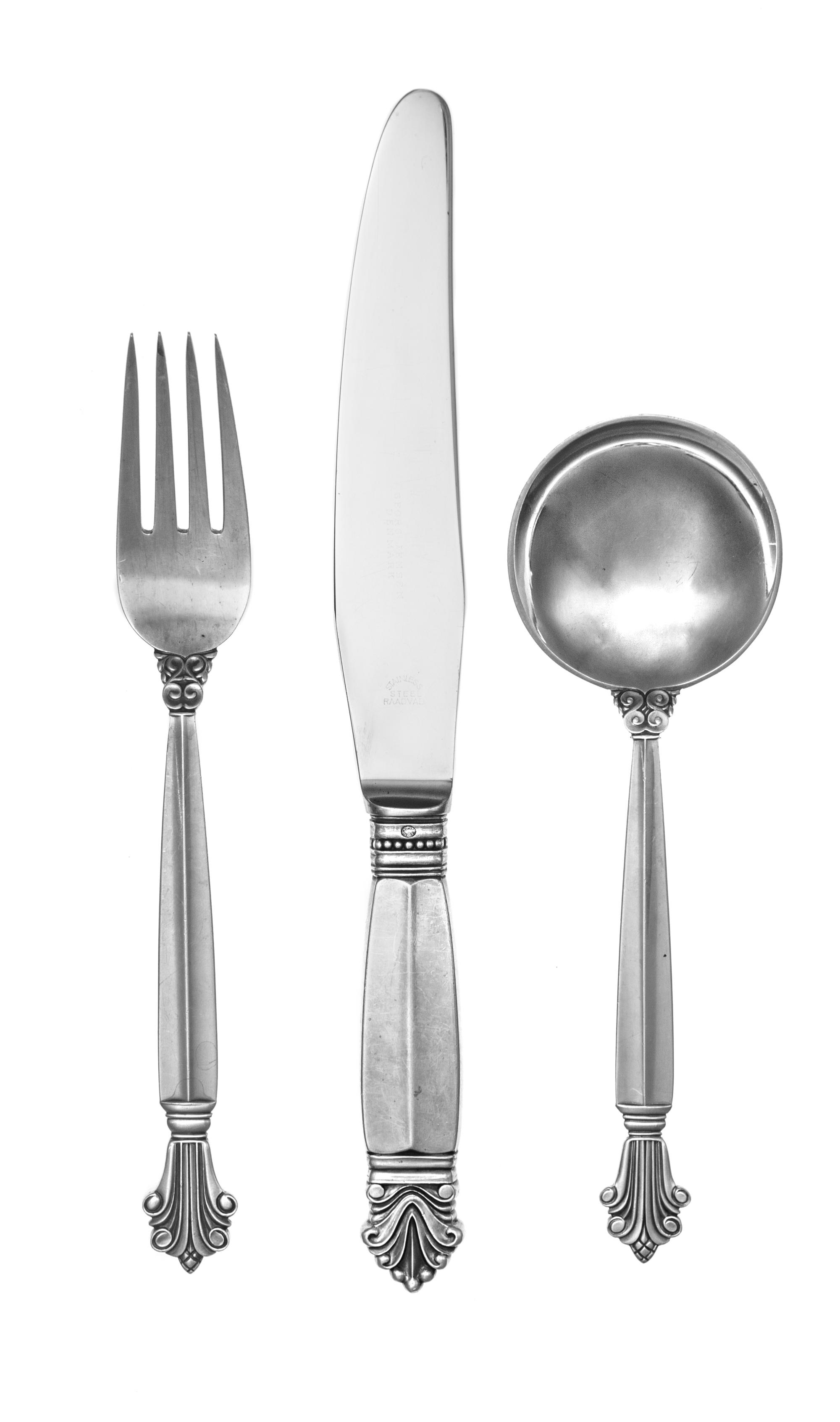 A Danish Silver Flatware Service, Georg Jensen Silversmithy, Copenhagen, Acanthus pattern, comprising: 12 dinner knives 12 butter sprea