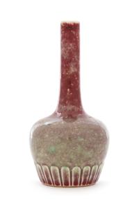A Peachbloom Glazed Porcelain Vase Height 6 1/4 inches.