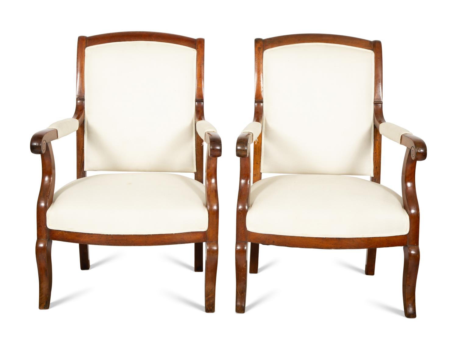 A Pair of French Walnut Fauteuils
