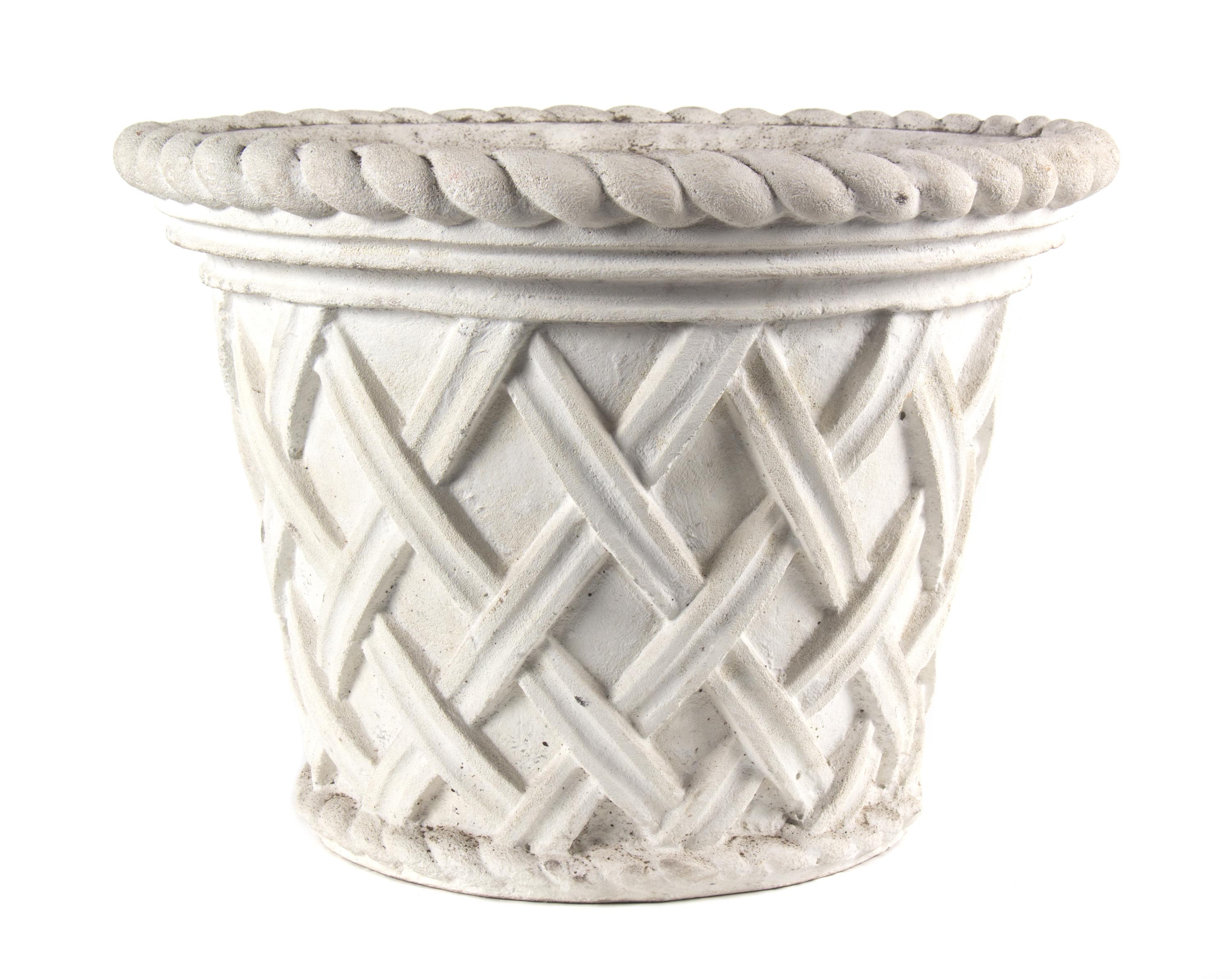 A Group of Five Concrete Planters Height of larger 15 1/2 inches x diameter 21 inches.