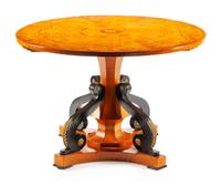 A Biedermeier Marquetry and Parcel Ebonized Center Table