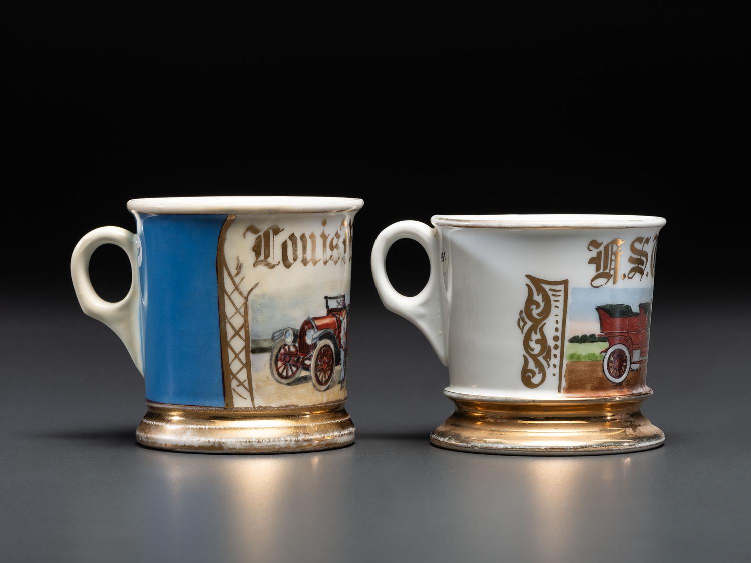 Two Automobile Related Porcelain Shaving Mugs