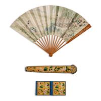 A Chinese Painted Folding Fan and Two Silk-Embroidered Accessories, 19th Century — 清晚期 紙本設色采蓮圖摺扇及黃地綉花扇套、錢包一套