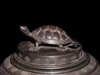 A Large Bronze Covered Jar