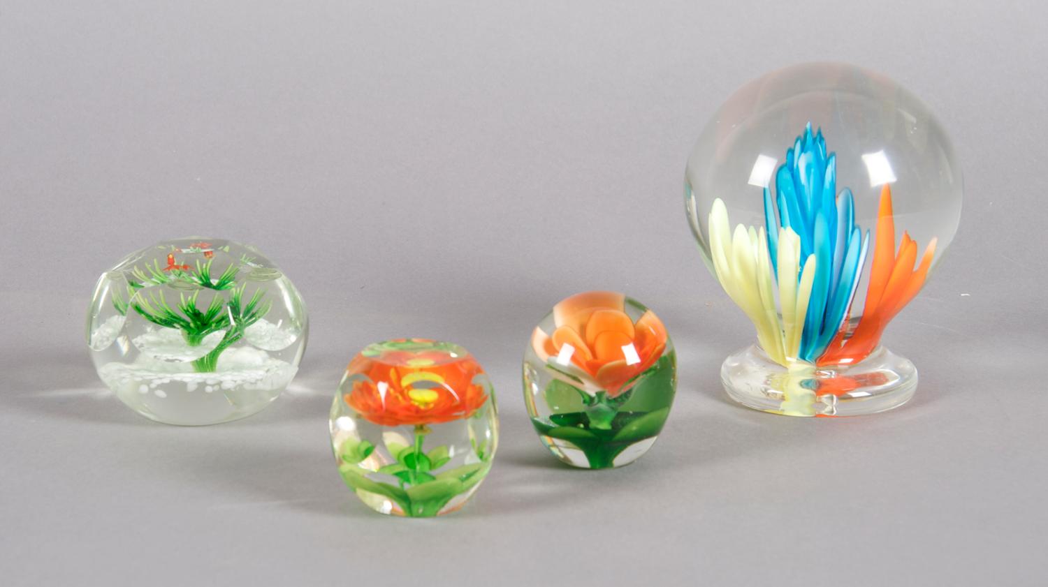 A Collection of Four Paperweights, Height of first 5 1/2 inches.