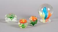 A Collection of Four Paperweights, Height of first 5 1/2 inches.