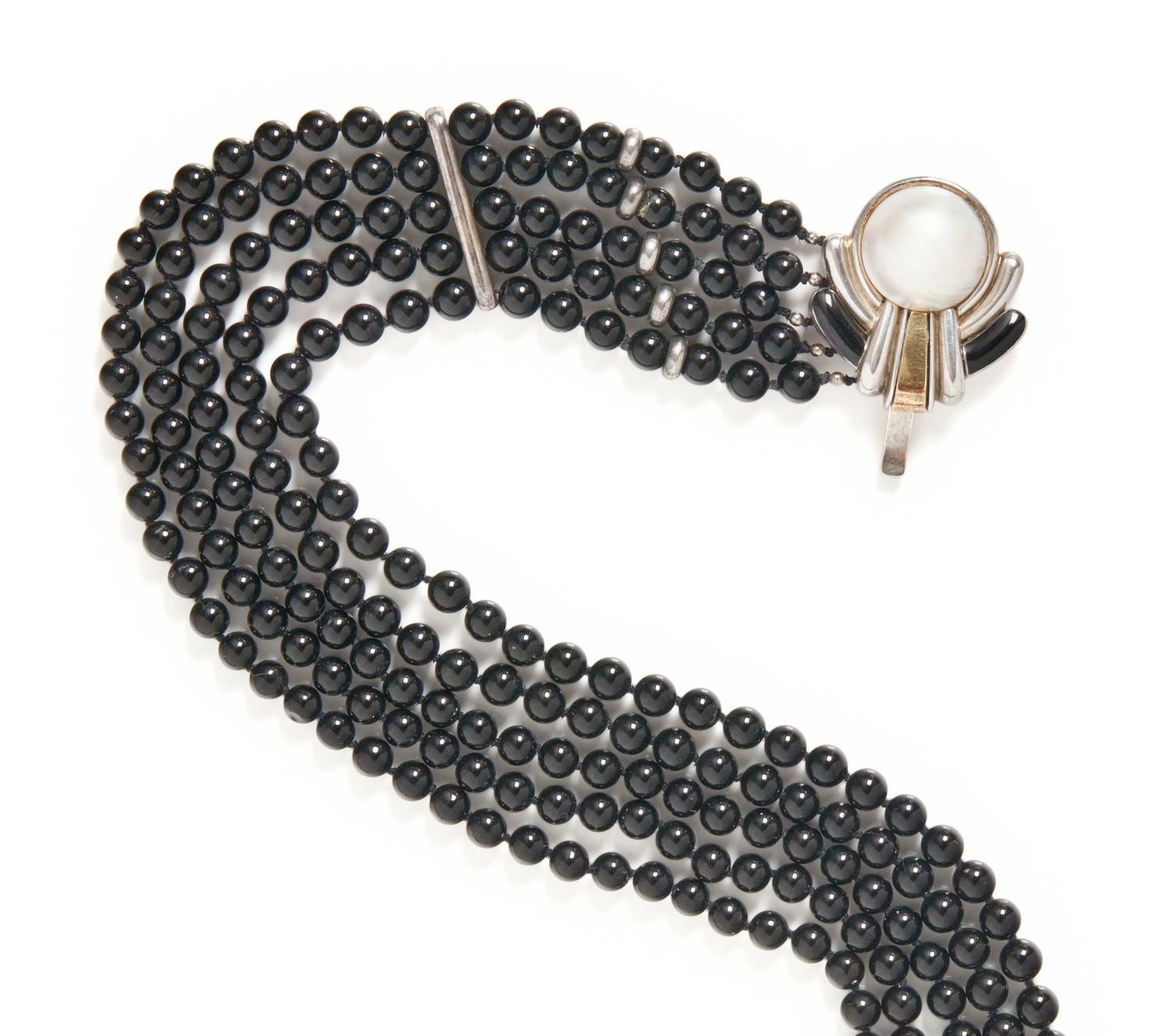 CARTIER, STERLING SILVER, YELLOW GOLD, CULTURED PEARL AND ONYX JEWELRY SUITE