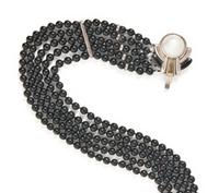 CARTIER, STERLING SILVER, YELLOW GOLD, CULTURED PEARL AND ONYX JEWELRY SUITE
