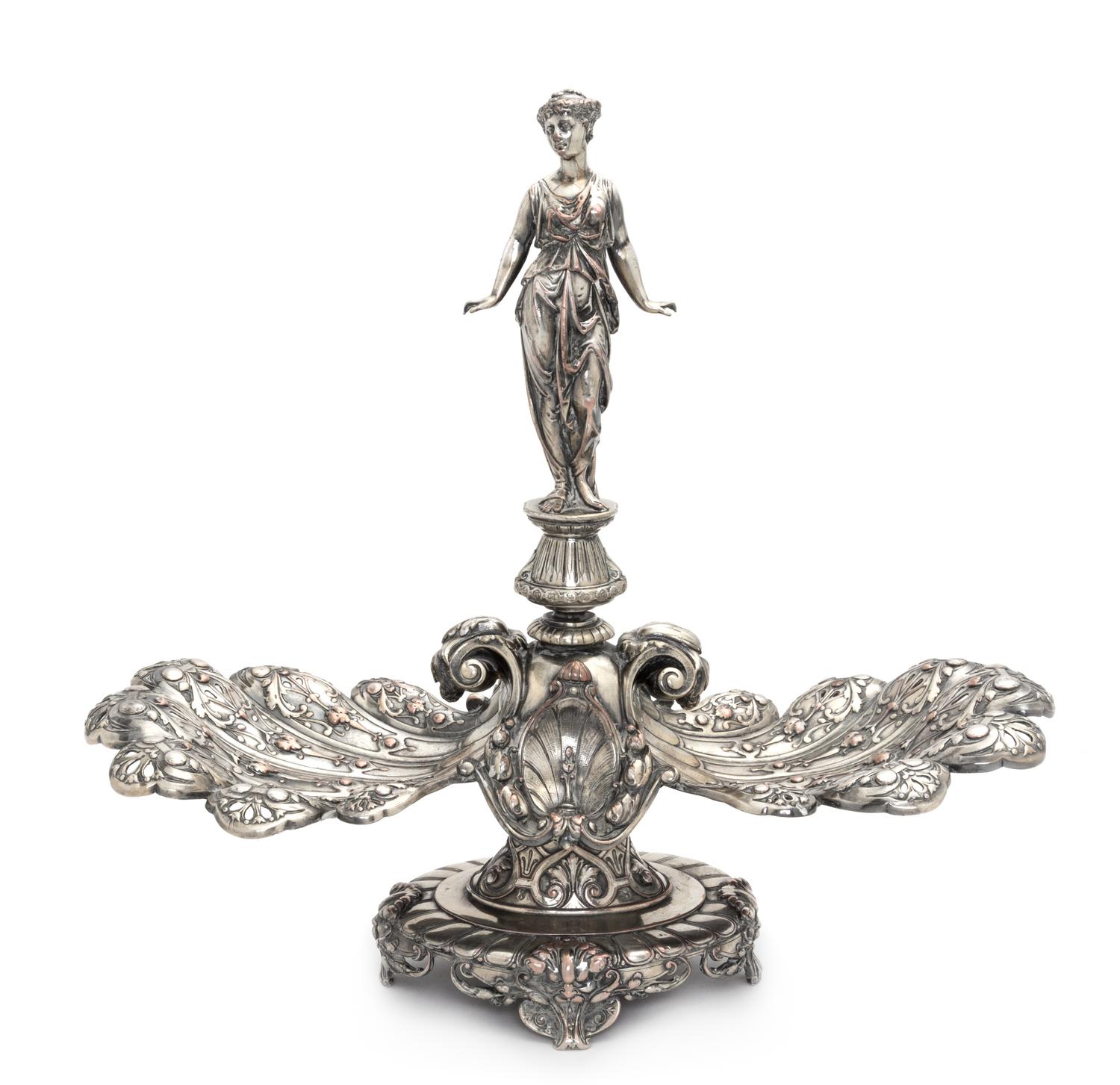 An English Silver-Plate Centerpiece, Elkington & Co., Birmingham, 19th Century, the central figure in the form of a draped maiden flank
