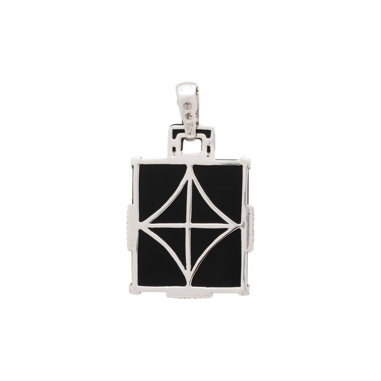 BLACK ONYX, RUBY, AND DIAMOND PENDANT