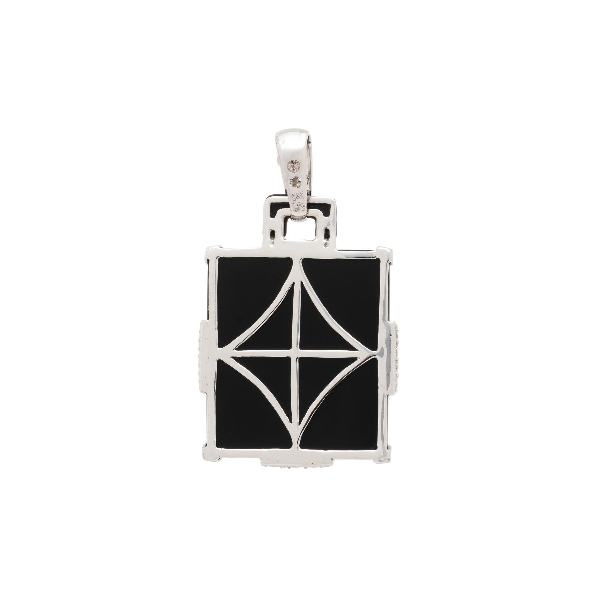 BLACK ONYX, RUBY, AND DIAMOND PENDANT