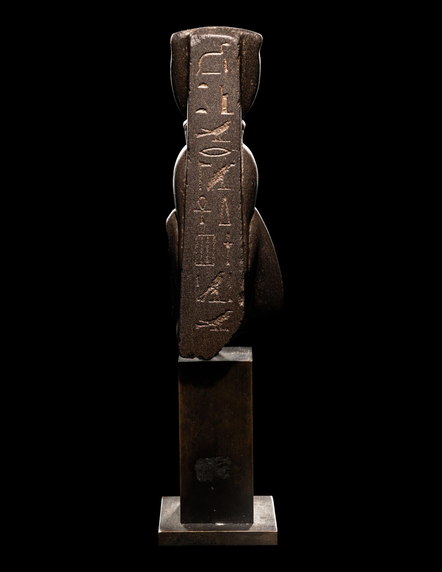 An Egyptian Greywacke Bust of Isis-Hathor