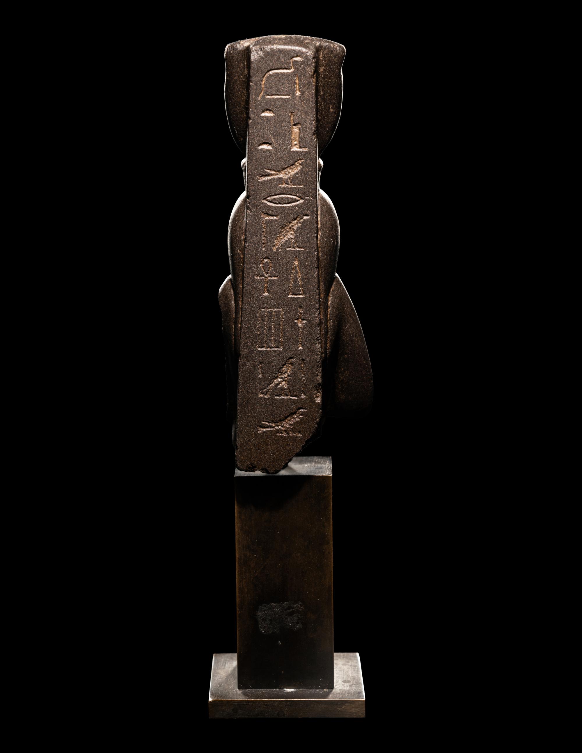 An Egyptian Greywacke Bust of Isis-Hathor