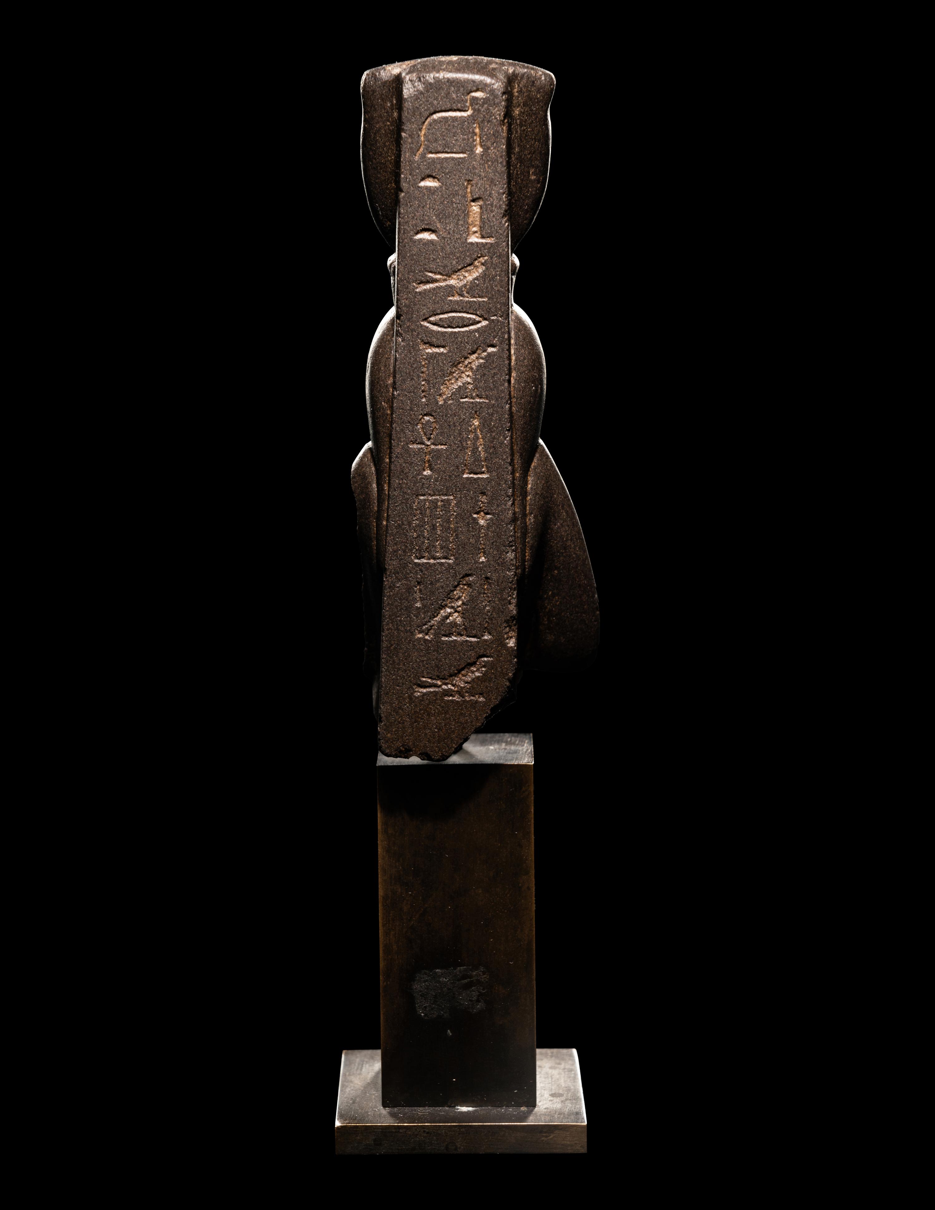 An Egyptian Greywacke Bust of Isis-Hathor