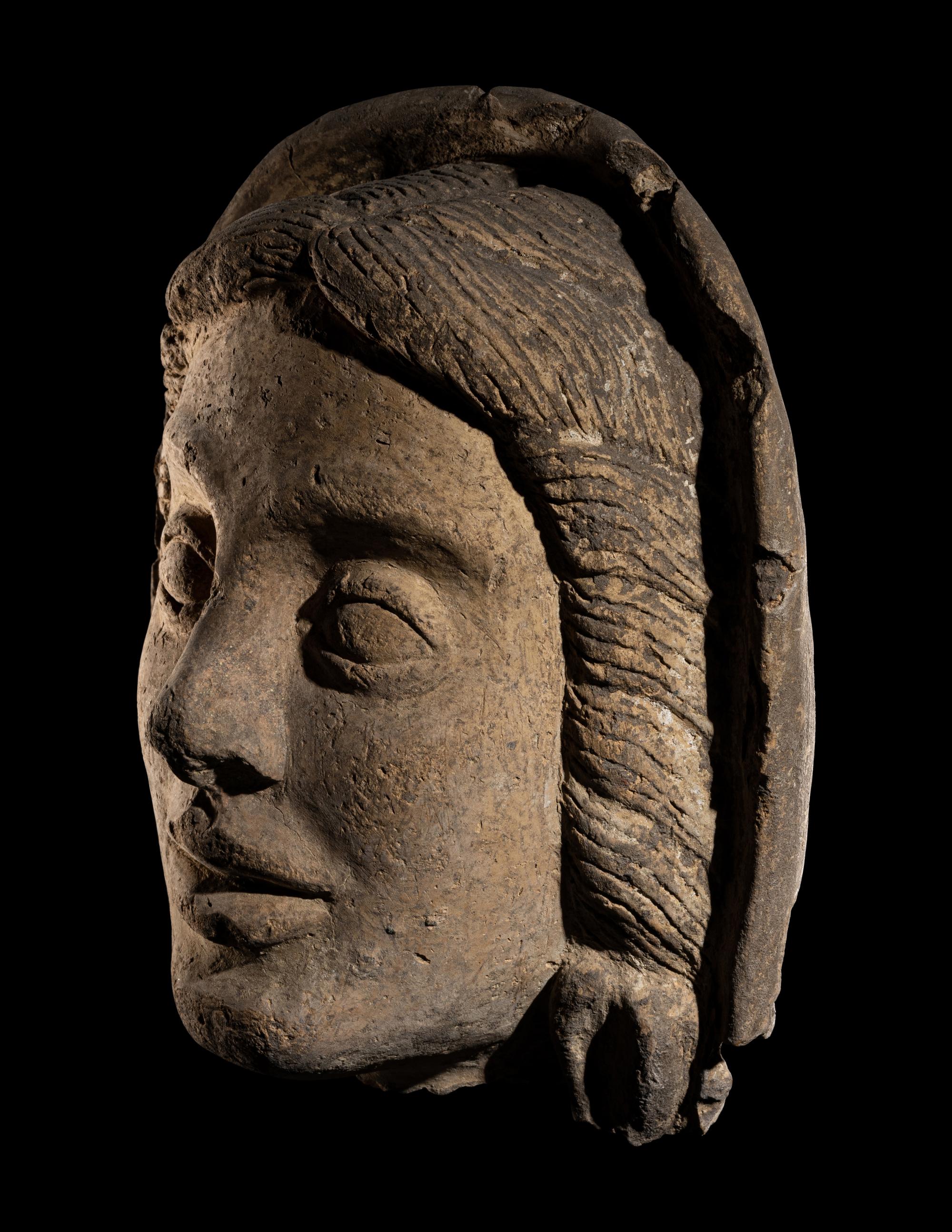 An Etruscan Terracotta Votive Head of a Woman