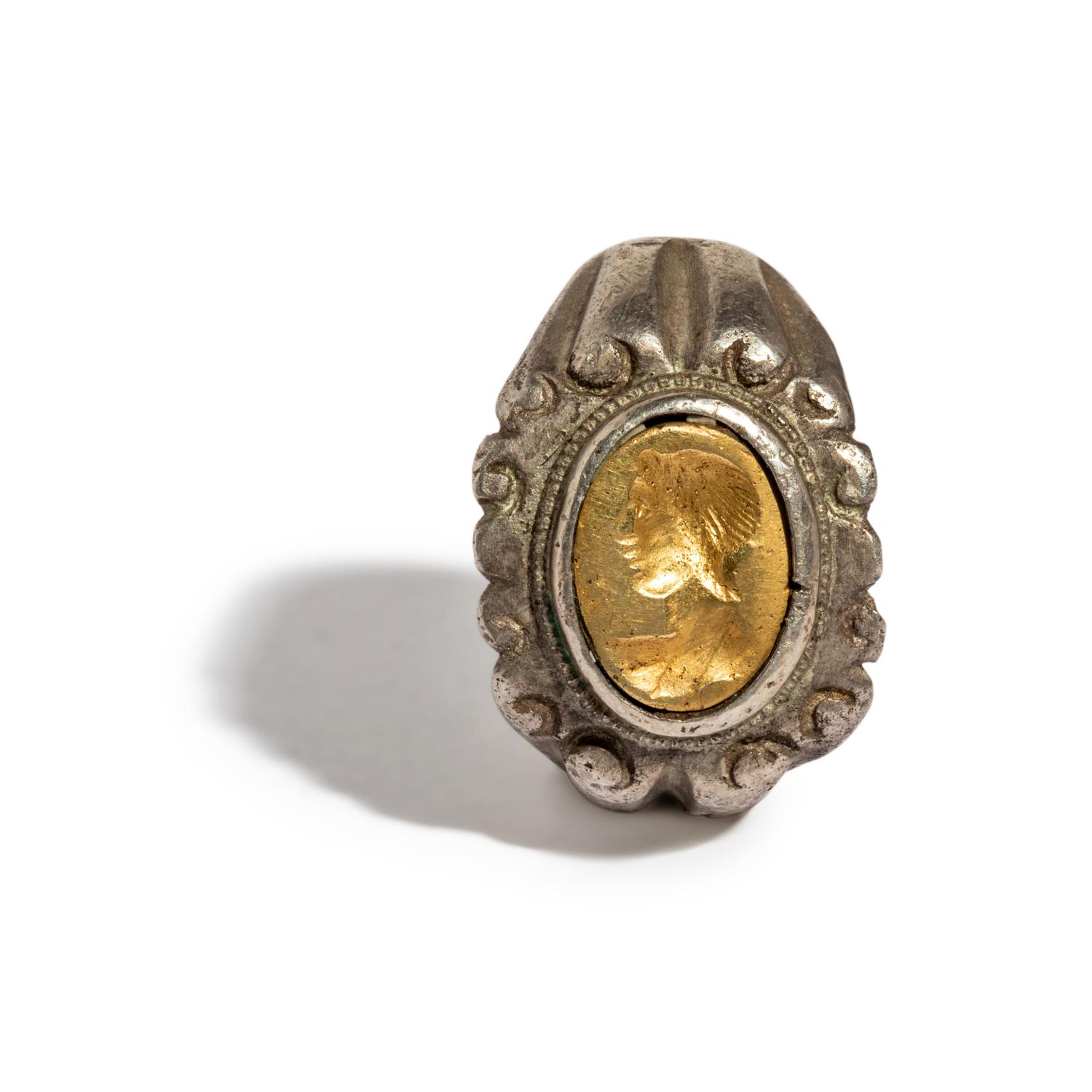 A Roman Silver and Gold Finger Ring with a Portrait Head