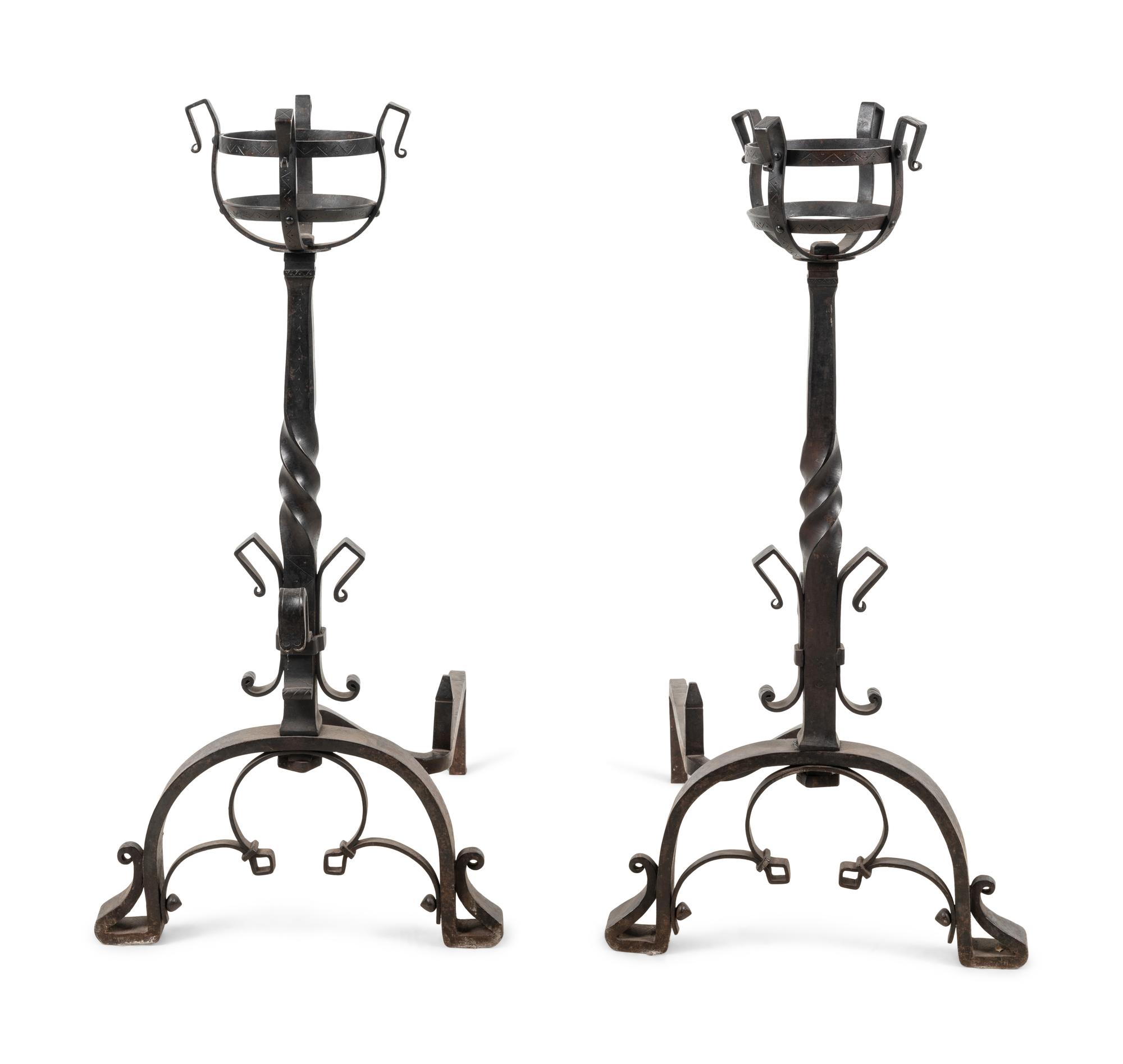A Pair of Continental Iron Andirons