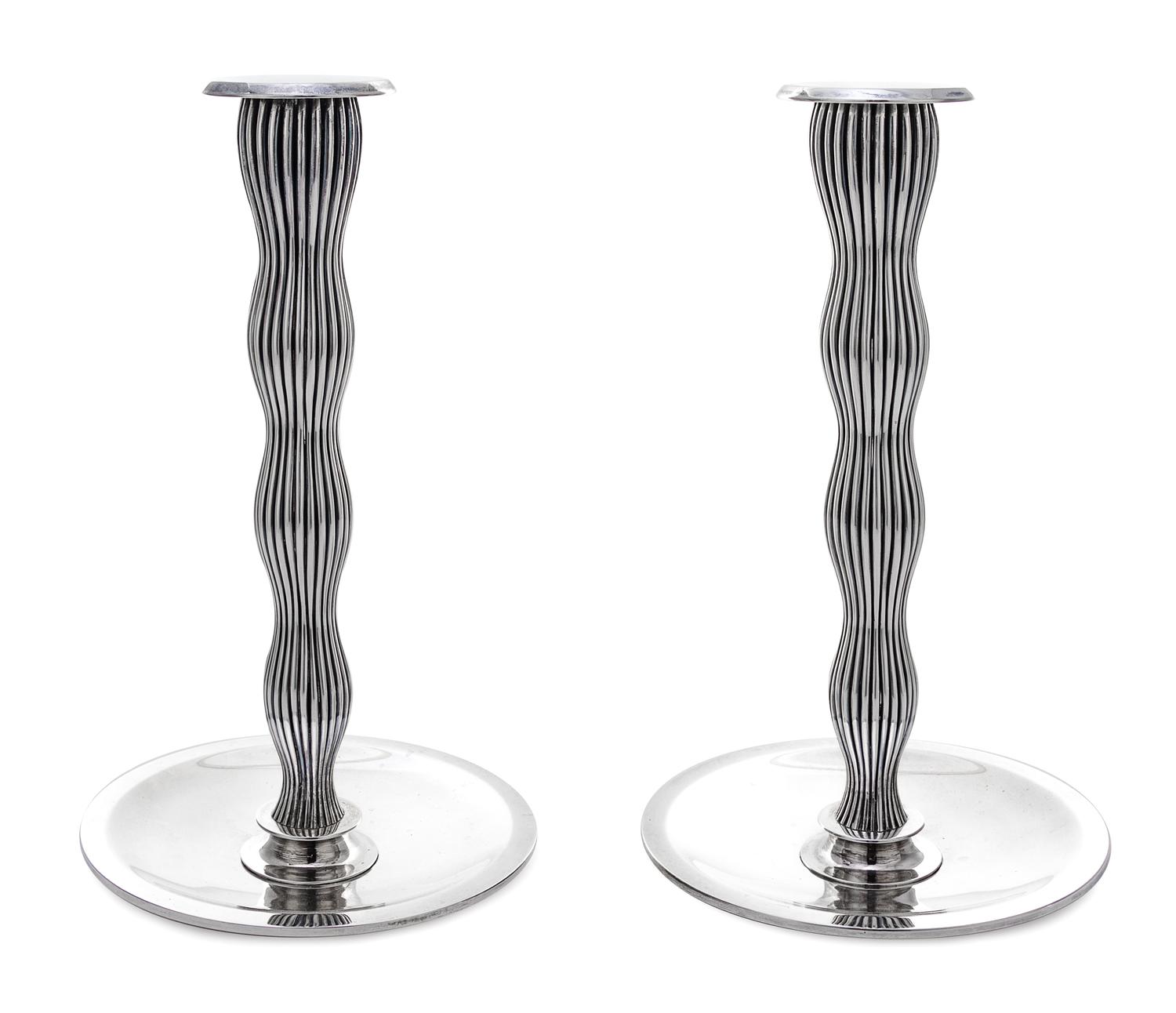 A Pair of Danish Silver Candlesticks, Designed by Svend Weihrauch for Frantz Hingelberg, Aarhus, Mid-20th Century, of tapered and undul